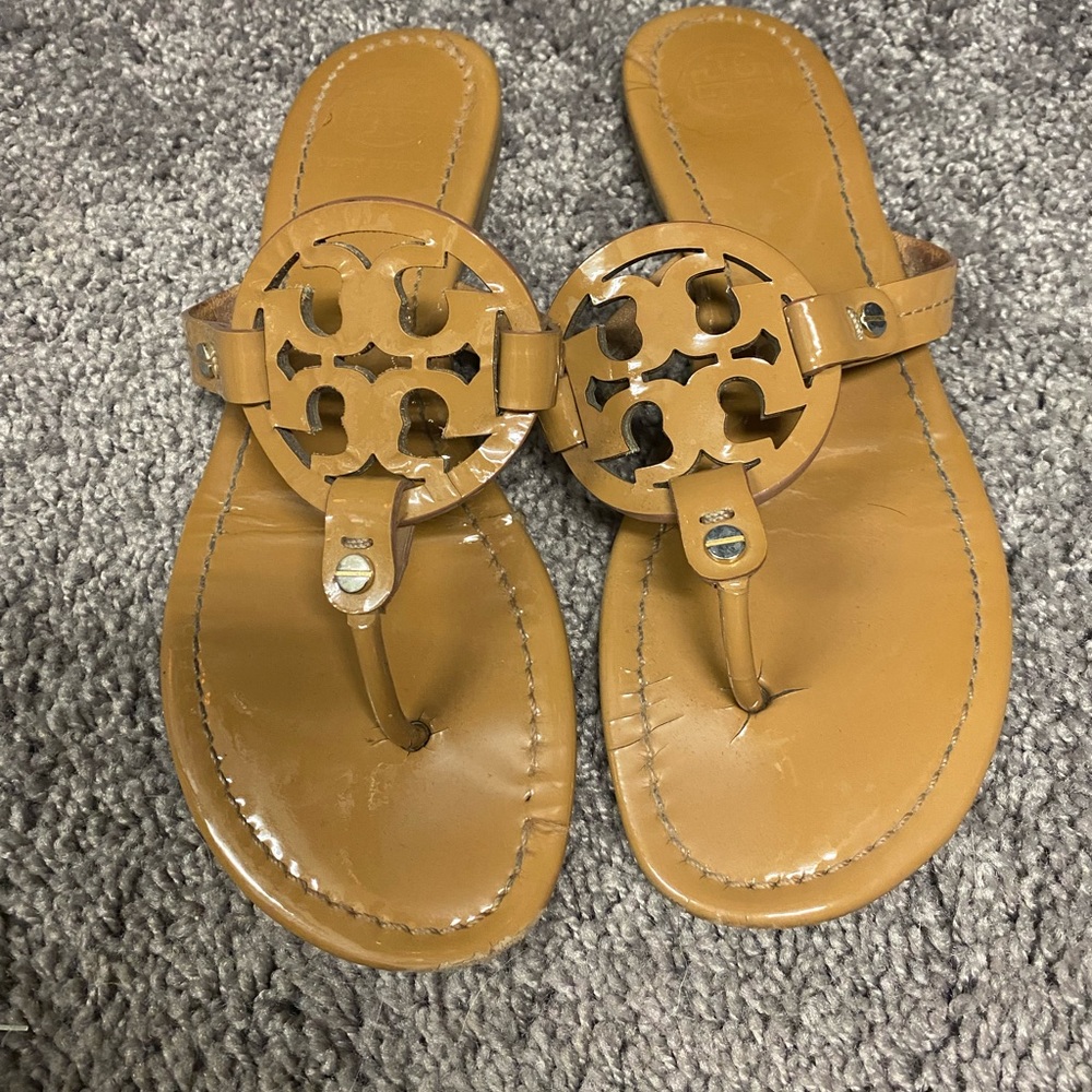 Tory Burch Miller Sandal. Gentle wear. Color is a nude, patent leather